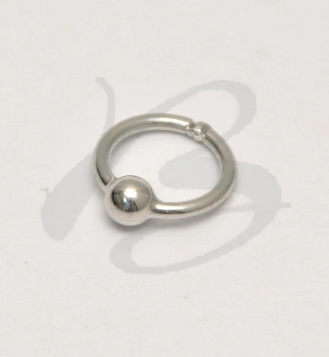 ZAMAK PIERCING HOLDER WITH FIXED SPHERE IN VARIOUS SIZES AND  COLOURS